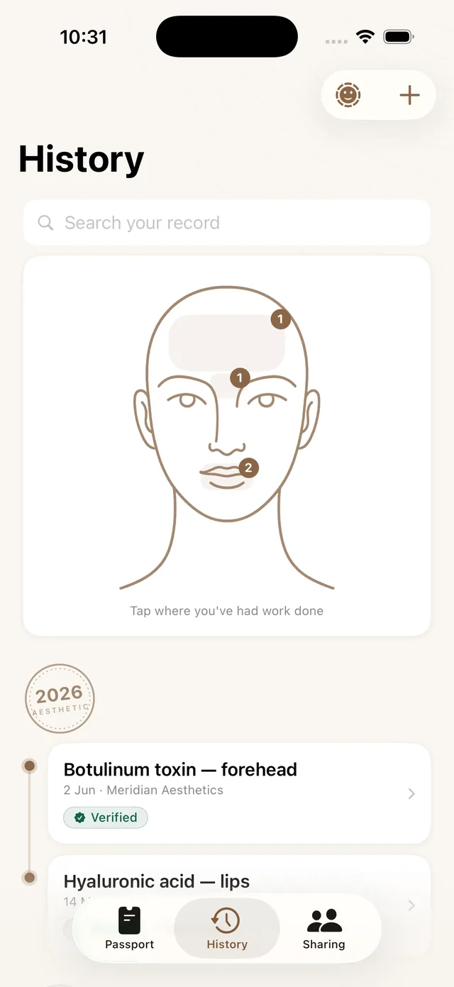 The face map in the app. A fine line drawing of a face with counts on the treated regions